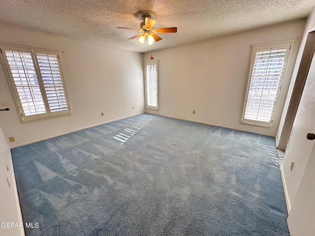 3100 Hector Dr, El Paso, TX 79935 - empty room with a ceiling fan, a textured ceiling, carpet floors, and baseboards