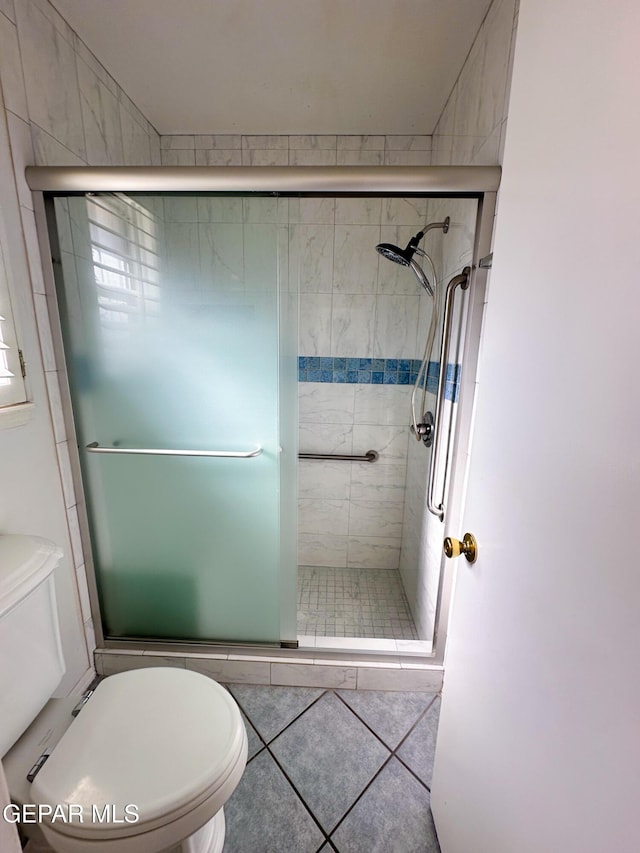 3100 Hector Dr, El Paso, TX 79935 - full bath with toilet, a shower stall, and tile patterned floors
