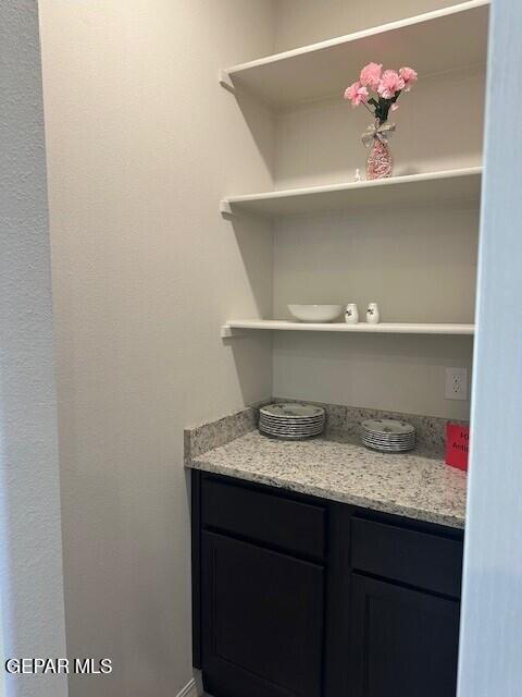 6112 Hidden Row Ave, El Paso, TX 79924 - bar with baseboards