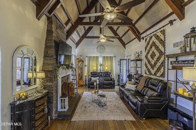 3244 Richmond Ave, El Paso, TX 79930 - living room with ceiling fan, high vaulted ceiling, hardwood / wood-style floors, a fireplace, and beam ceiling