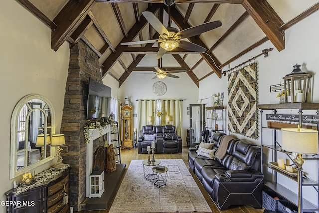 3244 Richmond Ave, El Paso, TX 79930 - living area with a ceiling fan, wood finished floors, high vaulted ceiling, beam ceiling, and a fireplace with raised hearth