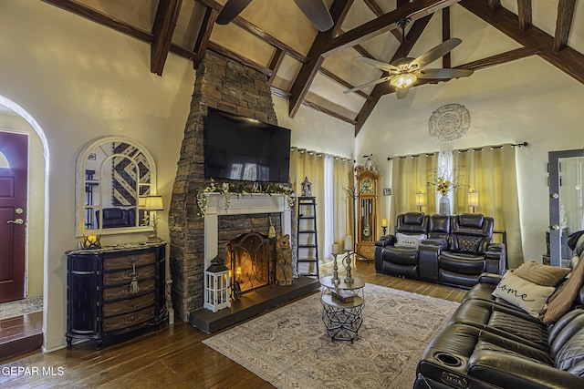 3244 Richmond Ave, El Paso, TX 79930 - living room with high vaulted ceiling, a ceiling fan, a fireplace, beam ceiling, and hardwood / wood-style flooring