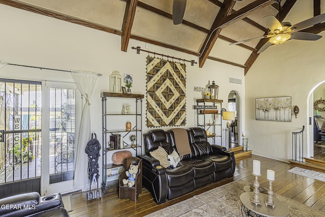 3244 Richmond Ave, El Paso, TX 79930 - living room featuring arched walkways, wood-type flooring, beam ceiling, ceiling fan, and high vaulted ceiling