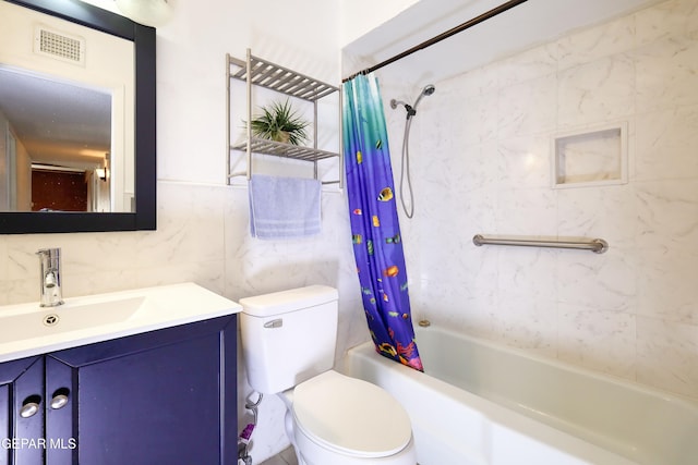 bathroom with tile walls, vanity, shower / bathtub combination with curtain, toilet, and backsplash