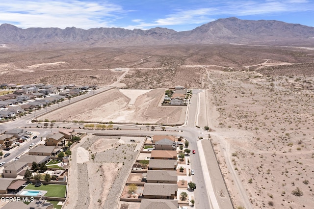 7421 Dewberry Dr, El Paso, TX 79911 - aerial view of property's location featuring nearby suburban area and a mountainous background