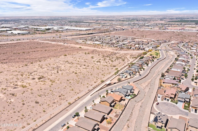 7421 Dewberry Dr, El Paso, TX 79911 - aerial view of property's location with nearby suburban area