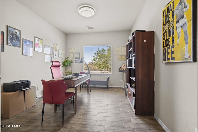 7421 Dewberry Dr, El Paso, TX 79911 - office area with wood finished floors and baseboards