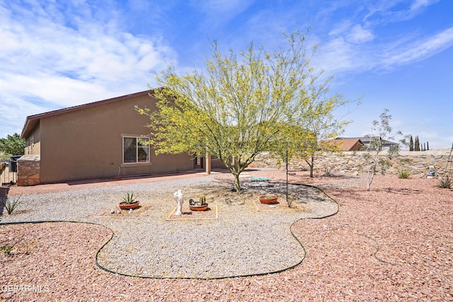 7421 Dewberry Dr, El Paso, TX 79911 - back of property featuring stucco siding