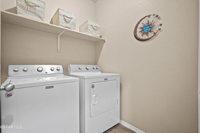 7421 Dewberry Dr, El Paso, TX 79911 - laundry room featuring washer and dryer