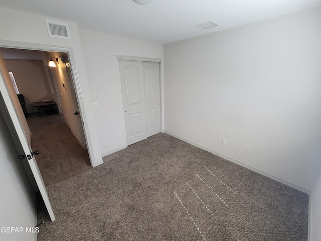 13611 Everingham St, El Paso, TX 79928 - unfurnished bedroom with carpet floors, baseboards, and a closet