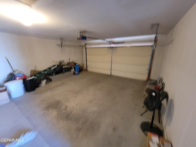 13611 Everingham St, El Paso, TX 79928 - garage featuring a garage door opener