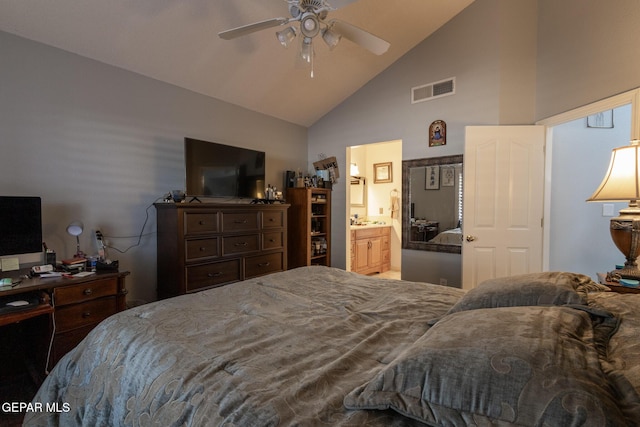 bedroom featuring high vaulted ceiling, ceiling fan, connected bathroom, and a desk