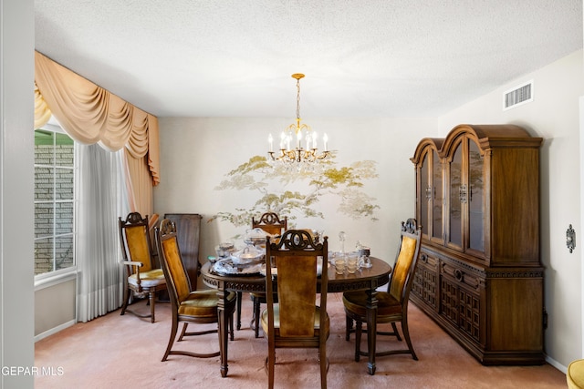 dining space with a chandelier, carpet, and baseboards