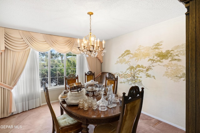 carpeted dining space with a chandelier, baseboards, and a textured ceiling