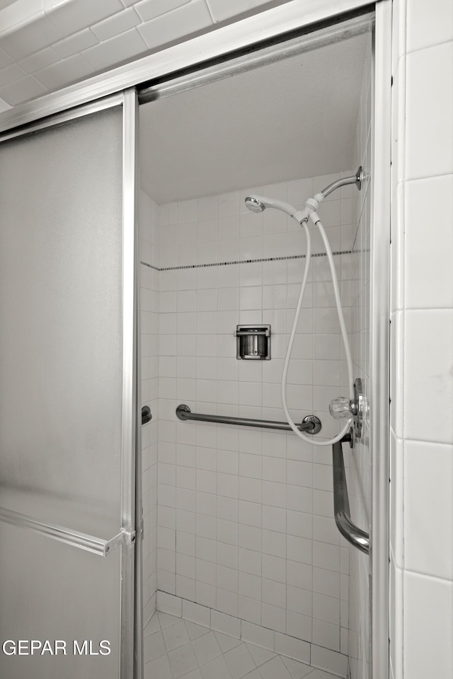bathroom with a stall shower
