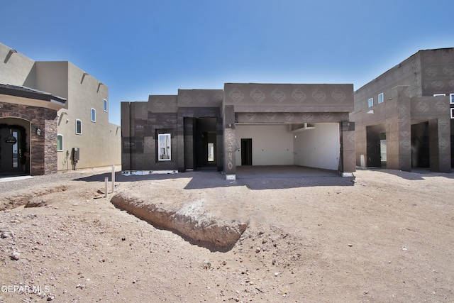 13240 Verwood Dr, El Paso, TX 79928 - southwest-style home with a garage, driveway, and stucco siding