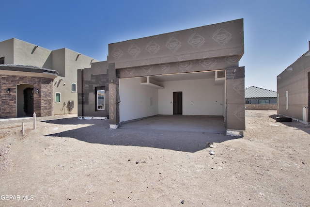13240 Verwood Dr, El Paso, TX 79928 - view of front of house featuring stucco siding and a garage