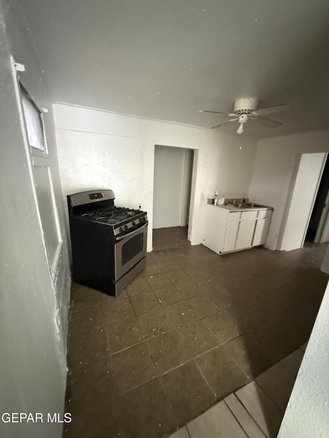 716 N Glenwood St, El Paso, TX 79905 - kitchen featuring stainless steel gas stove and a ceiling fan