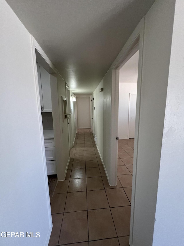 6044 Cabrillo Dr, El Paso, TX 79912 - hallway featuring tile patterned flooring
