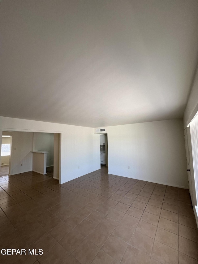6044 Cabrillo Dr, El Paso, TX 79912 - empty room featuring light tile patterned floors