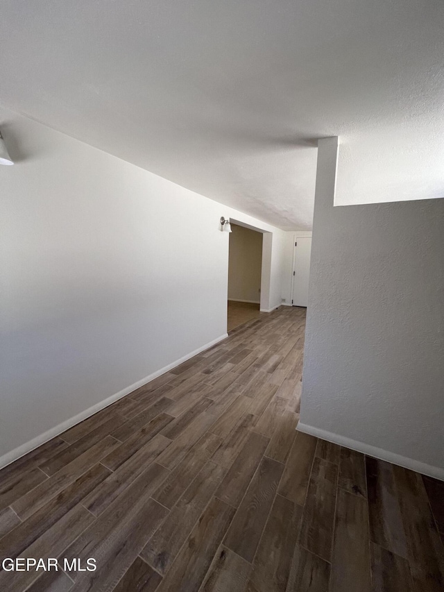 6044 Cabrillo Dr, El Paso, TX 79912 - unfurnished room featuring wood finished floors and baseboards