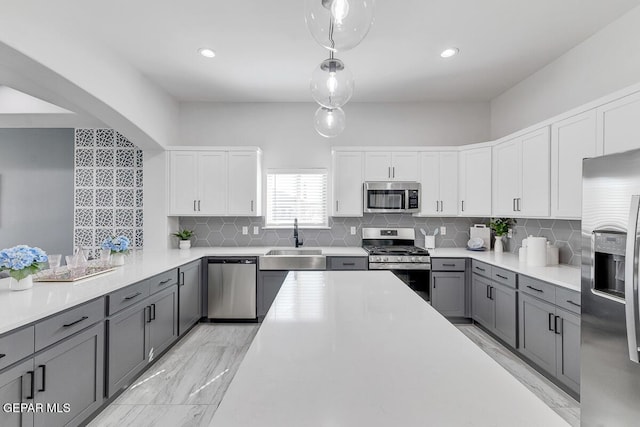 10705 Troy Aikman Dr, El Paso, TX 79924 - kitchen with appliances with stainless steel finishes, gray cabinets, a sink, white cabinetry, and recessed lighting