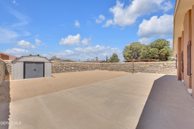 12273 El Greco Cir, El Paso, TX 79936 - view of patio / terrace with a shed, an outdoor structure, and fence