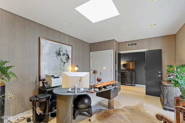 1114 Los Jardines Cir, El Paso, TX 79912 - office area with light tile patterned flooring and a skylight