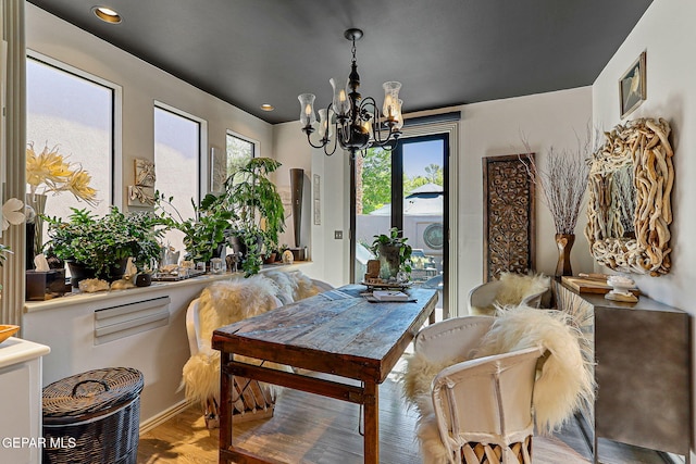 1114 Los Jardines Cir, El Paso, TX 79912 - dining space with a chandelier, wood finished floors, and recessed lighting