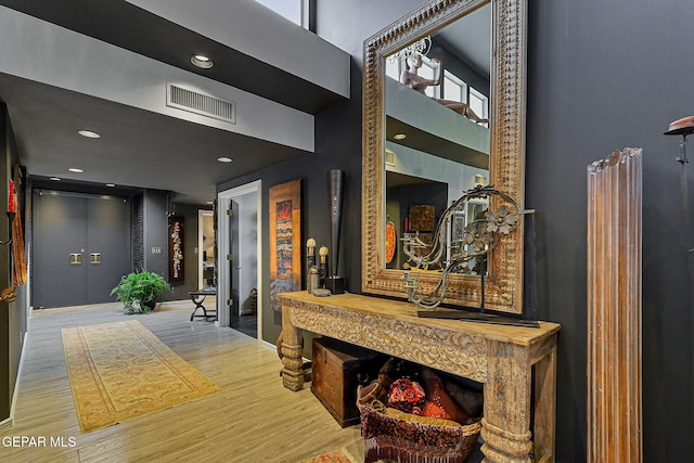 1114 Los Jardines Cir, El Paso, TX 79912 - hallway with wood finished floors, recessed lighting, and a high ceiling