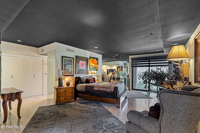 1114 Los Jardines Cir, El Paso, TX 79912 - bedroom with wood finished floors and recessed lighting