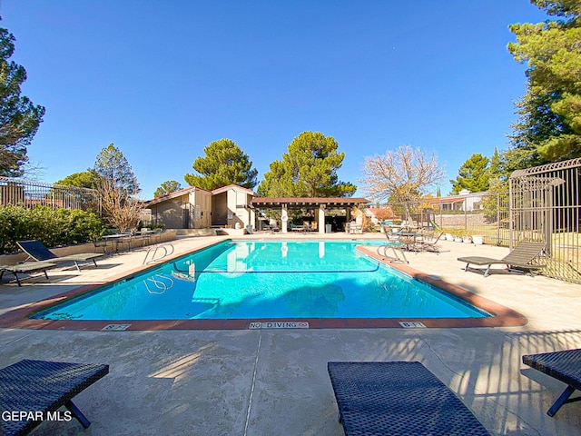 1114 Los Jardines Cir, El Paso, TX 79912 - community pool with fence and a patio