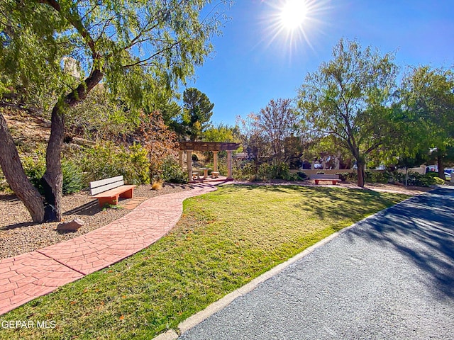 1114 Los Jardines Cir, El Paso, TX 79912 - view of grassy yard featuring a pergola
