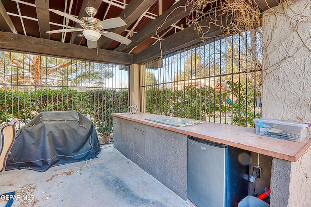 1114 Los Jardines Cir, El Paso, TX 79912 - view of patio / terrace with ceiling fan, grilling area, and exterior kitchen