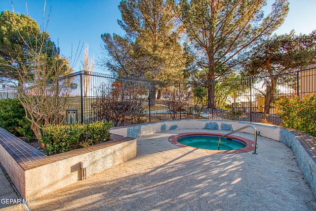 1114 Los Jardines Cir, El Paso, TX 79912 - view of pool with an in-ground hot tub and fence