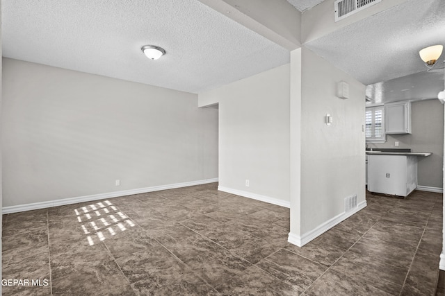 1393 Vista Granada Dr, El Paso, TX 79936 - unfurnished room featuring a textured ceiling and baseboards