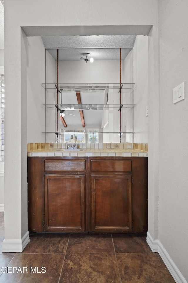 1393 Vista Granada Dr, El Paso, TX 79936 - indoor bar featuring baseboards and a textured ceiling