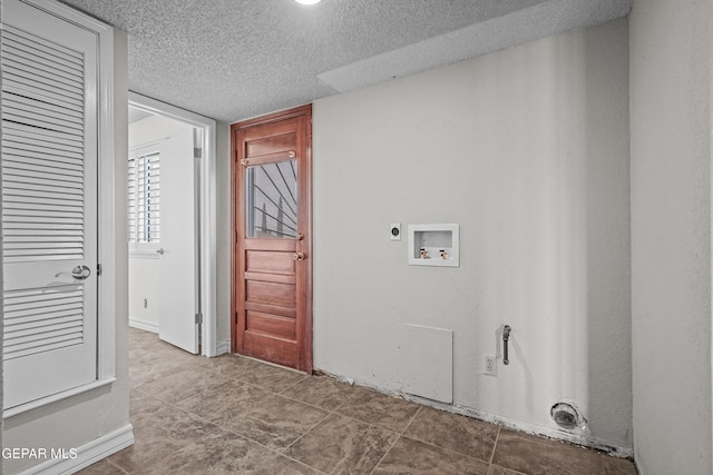 1393 Vista Granada Dr, El Paso, TX 79936 - laundry area featuring electric dryer hookup, washer hookup, and a textured ceiling