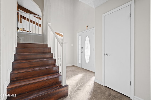 1393 Vista Granada Dr, El Paso, TX 79936 - foyer featuring stairs and baseboards