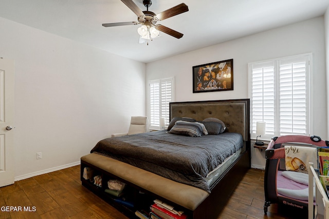 bedroom featuring wood-type flooring, baseboards, and ceiling fan