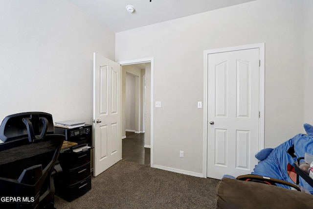 home office with dark carpet