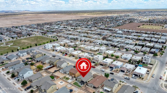 aerial view of property and surrounding area with nearby suburban area