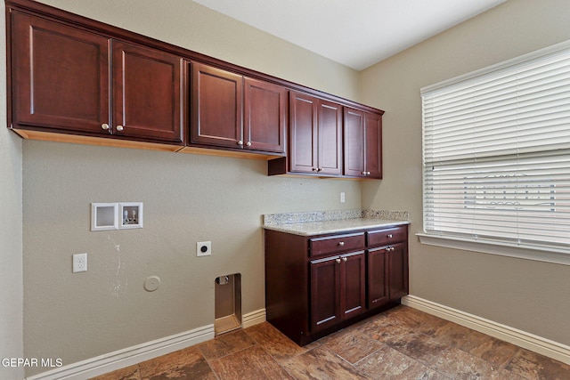 737 Colonial Blf, El Paso, TX 79928 - washroom featuring hookup for an electric dryer, baseboards, hookup for a washing machine, and cabinet space
