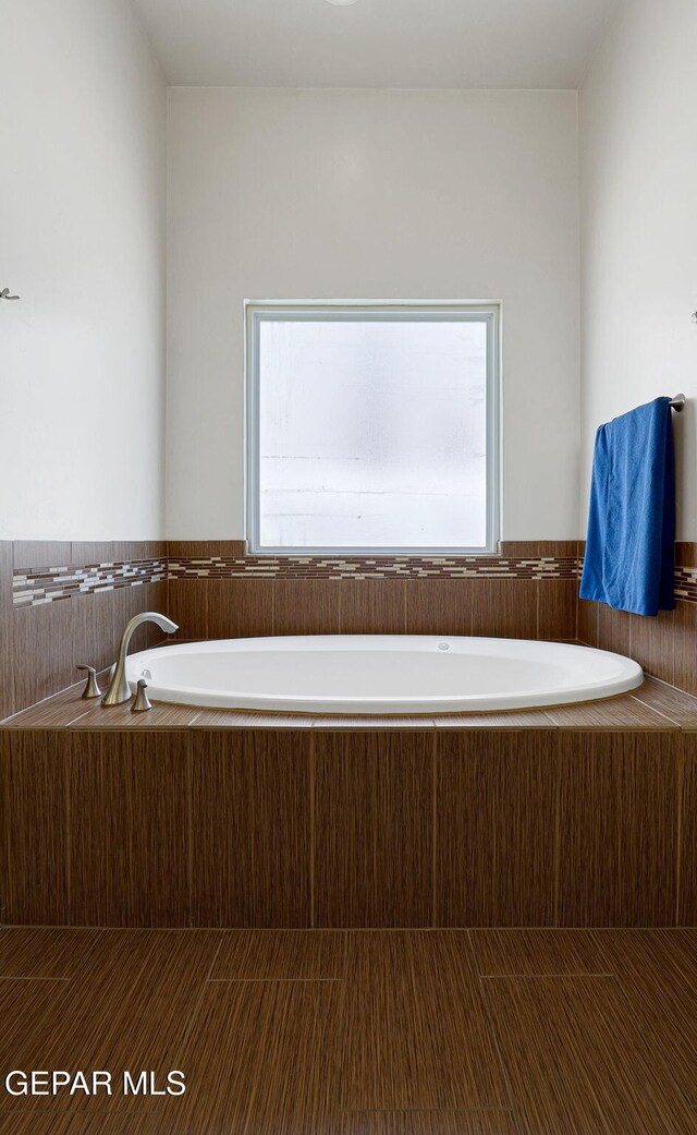 12748 Barstow Ave, El Paso, TX 79928 - bathroom with a garden tub