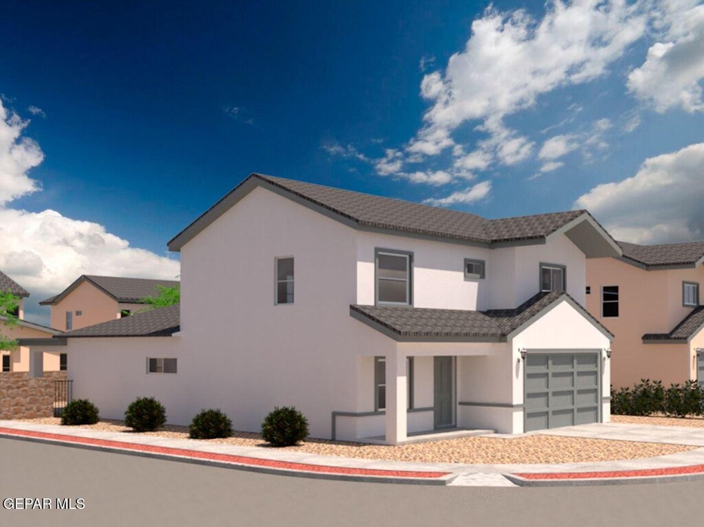 1192 Night Sky St, El Paso, TX 79928 - view of front of property with stucco siding, driveway, and a tiled roof