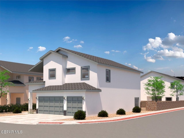 view of home's exterior with a garage, stucco siding, and concrete driveway