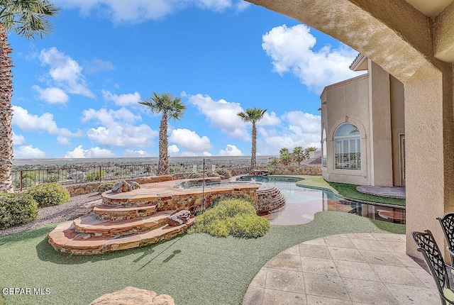 6664 Tuscany Ridge Dr, El Paso, TX 79912 - view of pool with an in-ground hot tub, a patio, and a fenced backyard