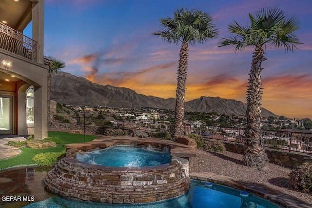 6664 Tuscany Ridge Dr, El Paso, TX 79912 - view of swimming pool featuring a mountain view and a pool with connected hot tub
