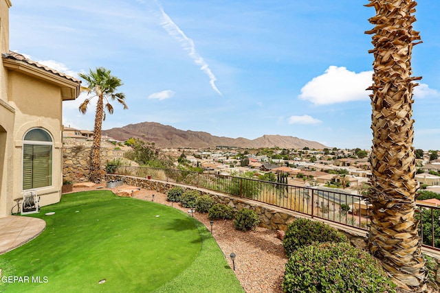 6664 Tuscany Ridge Dr, El Paso, TX 79912 - fenced backyard featuring a mountain view, a putting green, and a residential view