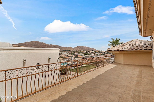 6664 Tuscany Ridge Dr, El Paso, TX 79912 - view of patio / terrace with a balcony and a mountain view